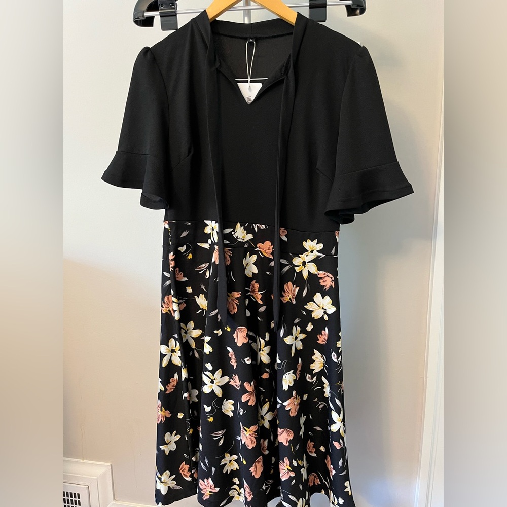 Brand new Black floral print dress.
